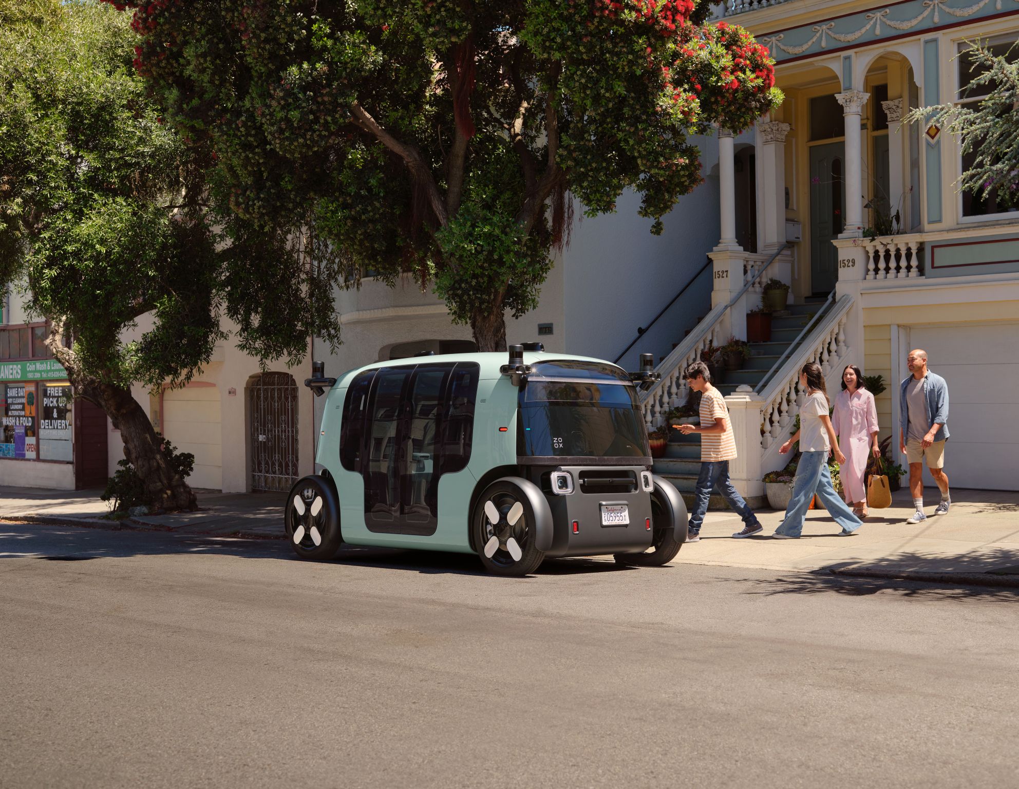 Autonomous mint green vehicle parked on urban street with pedestrians nearby