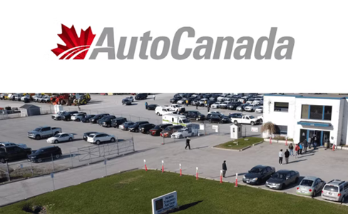 Auto Canada logo with red maple leaf above dealership parking lot