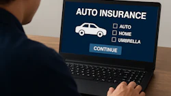 Laptop screen displaying auto insurance selection page with car icon and policy options