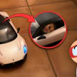 Toy white sports car with a small animal peeking out, cartoon character looking surprised