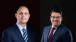 Two businessmen in navy suits, one bald and one wearing glasses, against dark backgrounds