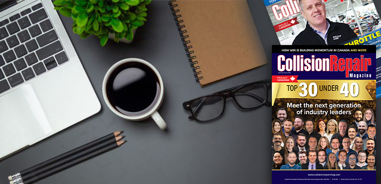 Workspace desk with laptop, coffee, magazine featuring Top 30 Under 40 industry leaders