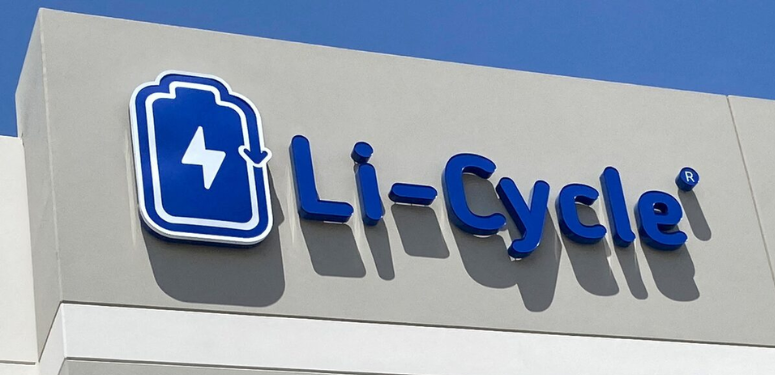 Li-Cycle blue logo with battery icon on white building exterior