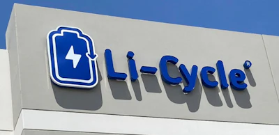 Li-Cycle blue logo with battery icon on white building exterior