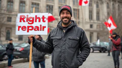 Protester holding 'Right repair' sign with Canadian flags in background