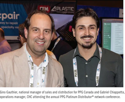 Two professionals at PPG Platinum Distributor conference networking in business attire