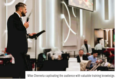 Professional speaker presenting at business conference with audience in background
