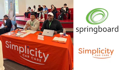 Simplicity Car Care booth with branded orange tablecloth at conference event
