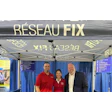 Réseau Fix trade show booth with three professionals under branded tent