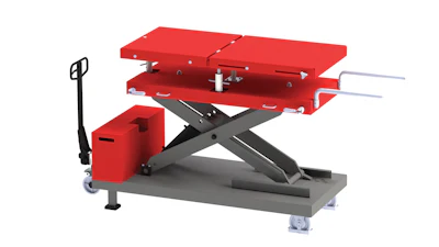 Red and gray industrial scissor lift platform with manual handle