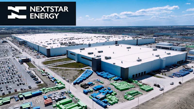 Aerial view of large Nextstar Energy industrial complex with white and blue buildings