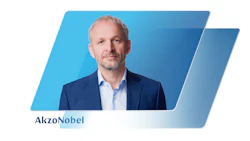 AkzoNobel executive in blue suit against blue gradient background