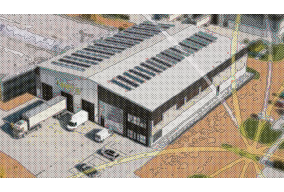 Aerial view of modern industrial building with solar panels and parking area