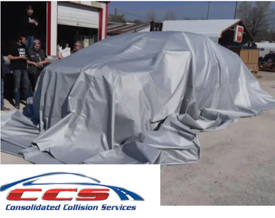 Consolidated Collision Services logo with covered vehicle in repair shop
