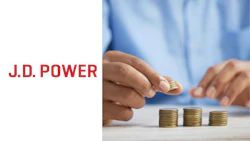 J.D. Power logo with hands stacking coins in background
