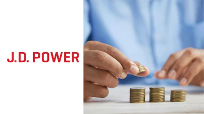 J.D. Power logo with hands stacking coins in background