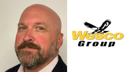Wesco Group corporate logo with black flying eagle and yellow text
