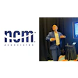 NCM Associates blue and white corporate logo with star symbol