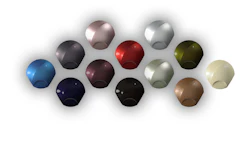 Glossy spheres in metallic colors arranged artistically on white background