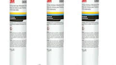Three 3M white industrial adhesive or sealant cartridges with white applicator tips