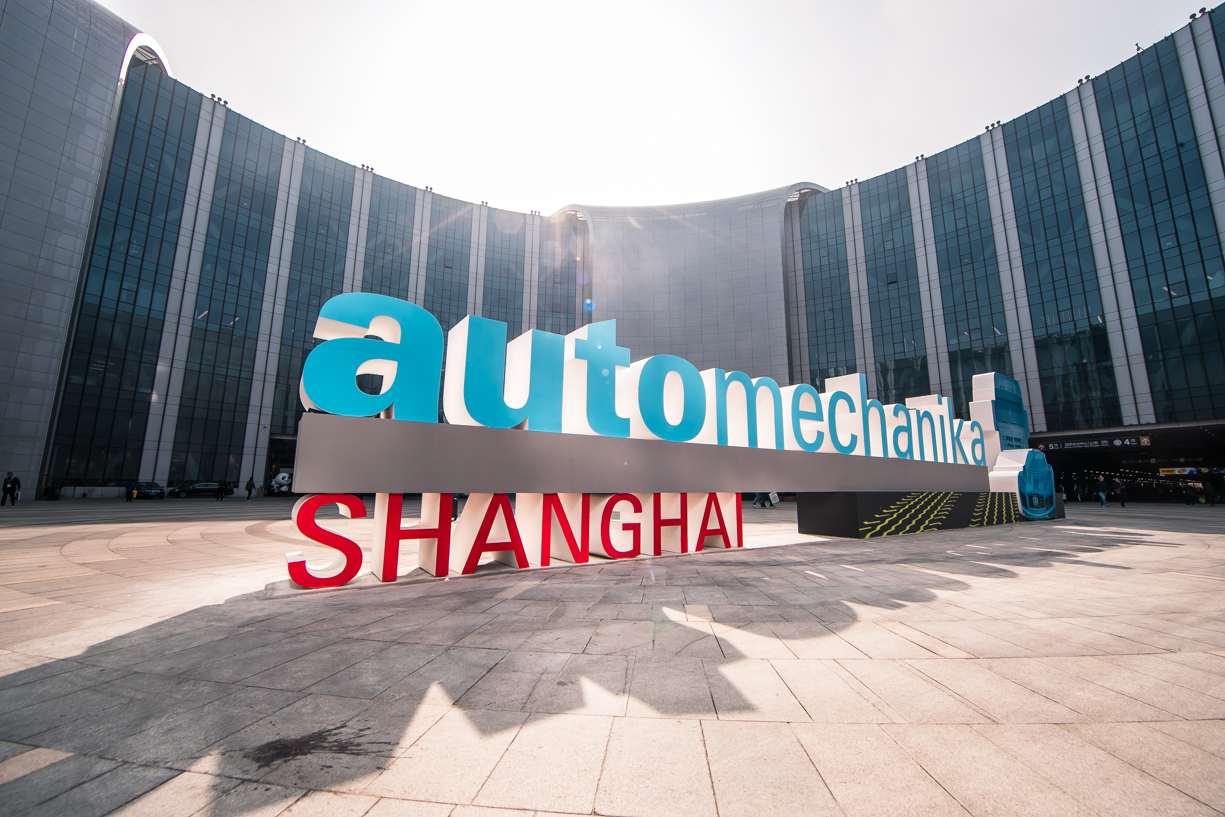 Automechanika Shanghai logo displayed in large 3D letters at modern conference center