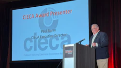 CIECA Award Presenter Paul Barry speaking at a conference podium