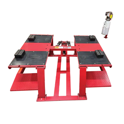 Red and black automotive vehicle alignment lift with hydraulic platform