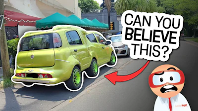 Lime green car with comically large wheels, cartoon character saying 'Can you believe this?'