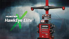 Hunter HawkEye Elite wheel alignment machine with red and green color scheme