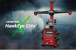 Hunter HawkEye Elite wheel alignment machine with red and green color scheme