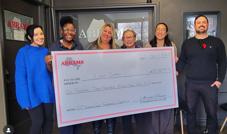 Abrams team presenting large donation check of $10,300 to Lupus Ontario