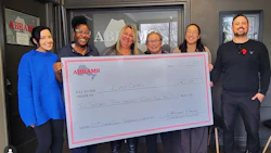 Abrams team presenting large donation check of $10,300 to Lupus Ontario