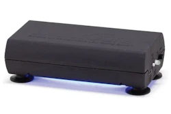 Black electronic device with blue LED lighting on bottom edges