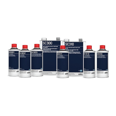 Collection of navy blue automotive or industrial chemical product bottles