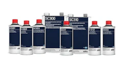 Collection of navy blue automotive or industrial chemical product bottles
