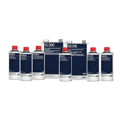 Collection of navy blue automotive or industrial chemical product bottles