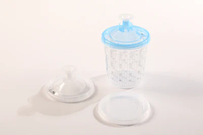 Medical collection container with white and blue lid components