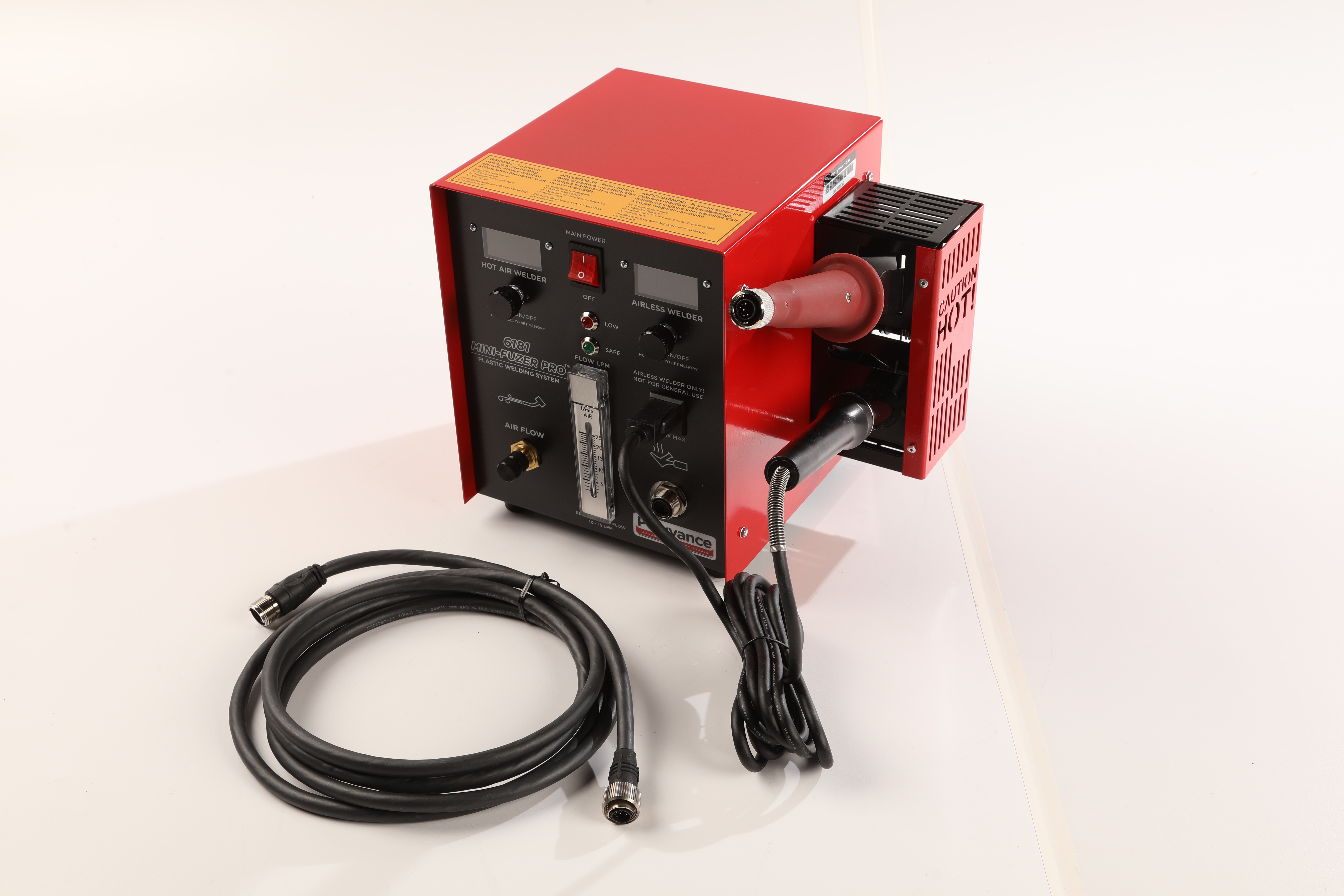 Red and black industrial power supply with digital control panel and black cables