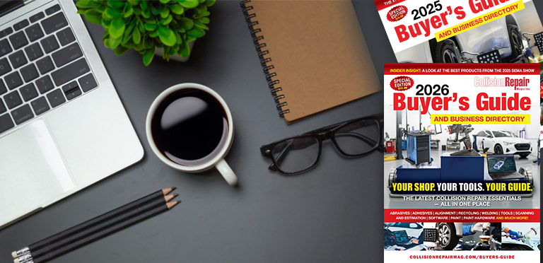 Workspace desk with laptop, coffee, pencils, and Buyer's Guide magazines