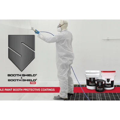 Worker in protective suit applying paint booth coating with product containers