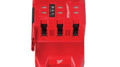 Red Milwaukee multi-battery rapid charger for power tools
