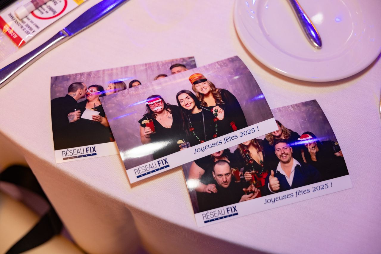 Holiday party photo booth prints from Réseau FIX team event in 2025