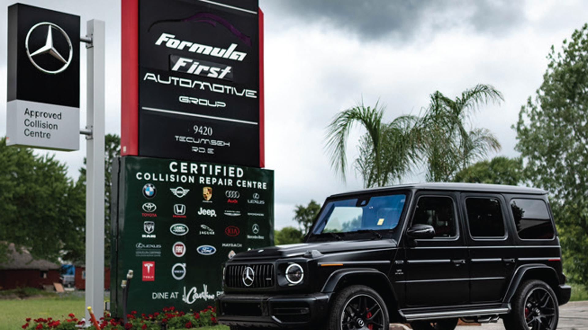 Black Mercedes-Benz G-Class SUV parked at certified collision repair center