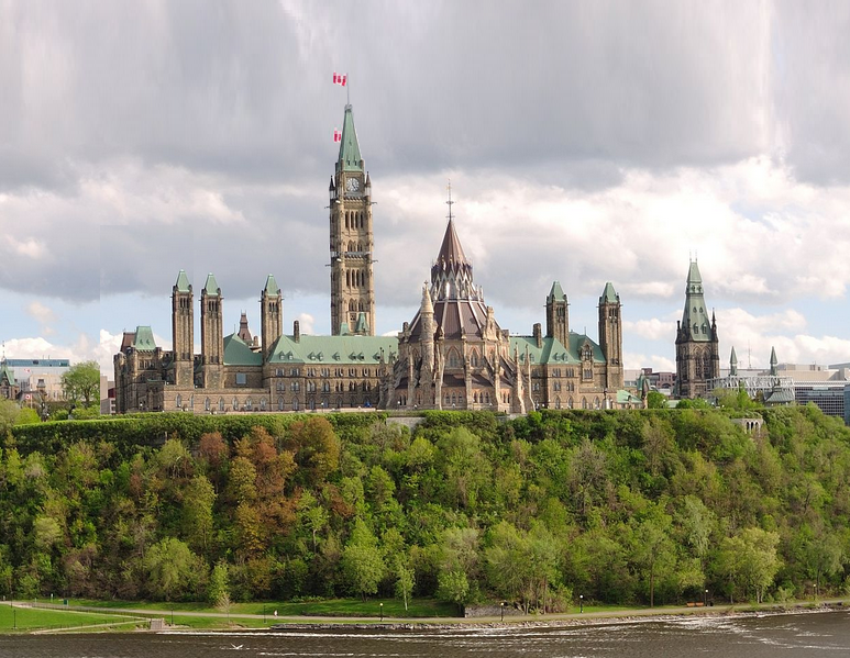 Canadian Parliament Buildings in Ottawa, with historic architecture and green landscape