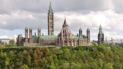 Canadian Parliament Buildings in Ottawa, with historic architecture and green landscape