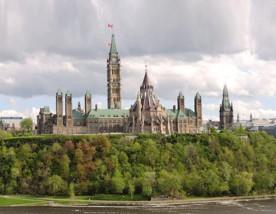 Canadian Parliament Buildings in Ottawa, with historic architecture and green landscape