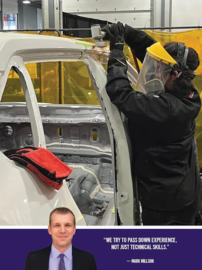Automotive worker in safety gear welding car door frame in manufacturing facility