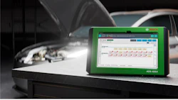 Bosch diagnostic tool ADS 625X on workbench with automotive equipment