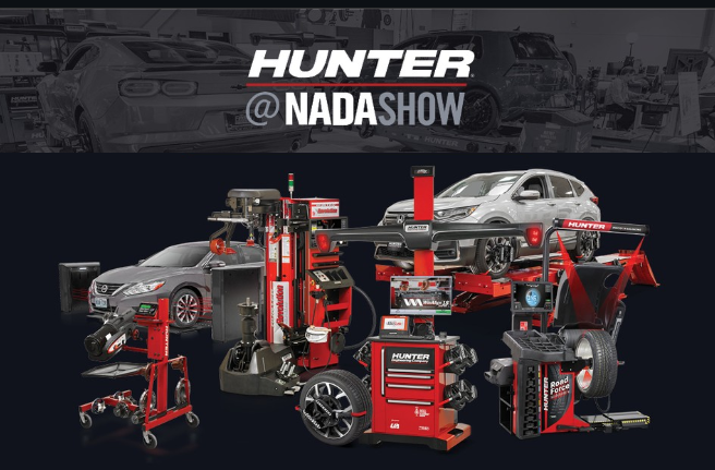 Hunter automotive equipment display with wheel balancers, lifts, and service tools at NADA Show