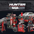 Hunter automotive equipment display with wheel balancers, lifts, and service tools at NADA Show